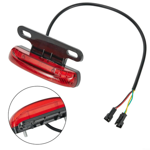 Slick E Bike Tail Light With Smart Brake Sensor For 36V To 48V Systems Ensures Your Night Rides Are Super Safe And Totally Lit For All The Commuters In Town. Red ABS e bike tail light with wiring harness
