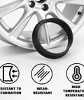 Premium Slick Car Wheel Hub Center Rings 4 Pack Adapts 73.1Mm Outer To 64.1Mm Inner Bore showing wear-resistant plastic ring near alloy wheel.