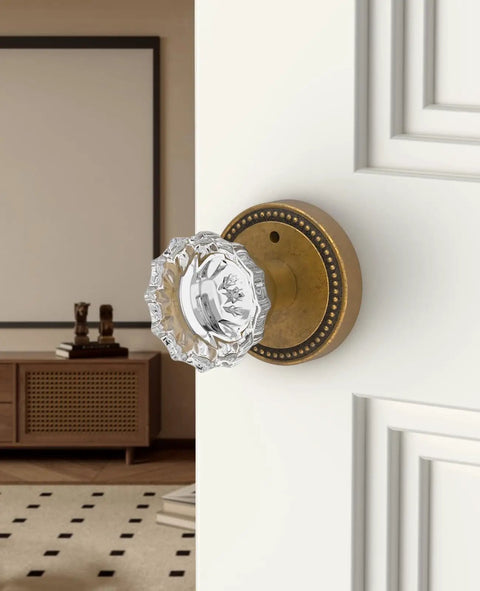Close-up of Six Pack Privacy Antique Brass Crystal Door Knobs With Lock for bedroom doors, showing vintage style hardware.