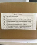 Safety warning label on cardboard box in multiple languages ensuring fire safety for Professional Brushless Electric Concrete Saw With No Fuss Water Cooling System For Zero Dust Grooving And Knockout Power Slab Cutting Up To Three Thousand Rpm Shop Ready.