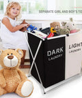 Girl playing near two section laundry basket hamper foldable waterproof cloth organizer with aluminum X frame and toys.