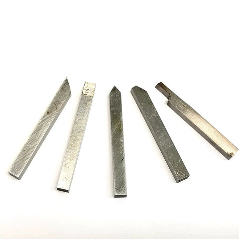 Heavy Duty Five Piece 4X4MM Carbide Lathe Cutter Bits, durable alloy tools designed for precision metalworking.