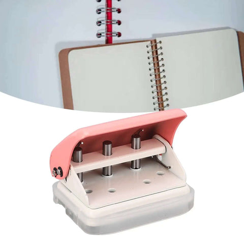 Ultimate Handheld 3-Hole Paper Puncher with 5-Sheet Capacity, shown in pink, durable metal build, next to spiral notebooks.