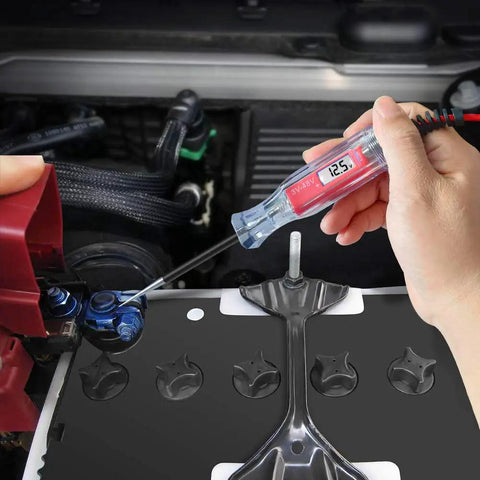 Testing car battery voltage with Beast Of A Heavy Duty 3 To 48V Digital LCD Circuit Tester, stainless probe visible