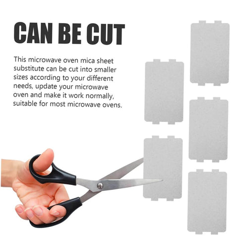 Microwave Mica Heat Resistant Insulation Plates Set Of 2 With 12 Sheets Per Pack, sheet being cut with scissors