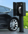 Built Like A Tank EV Charger Pedestal Featuring Drip Proof Galvanized Steel Housing secure cable storage with open door beside a vehicle.