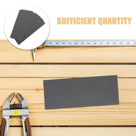 Premium 21 Piece Grit Wet Dry Sanding Paper Sheets on wooden surface with tools, showcasing sufficient grey waterproof sheets.