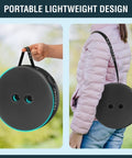 Upgraded Padded Collapsible Stool With Telescoping Height From 2.5 To 18 Inches shown in carry mode with strap
