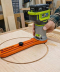 Circle Jig For Trim Routers Precise Circular Cutouts From 1.6 In To 37 In Adjustable Radius in use with Ryobi router on wood