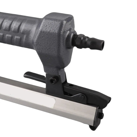 Lightweight 18 Gauge Pneumatic Brad Nailer Featuring A Durable Aluminum Frame And Reliable Trigger Action, close-up of trigger mechanism.
