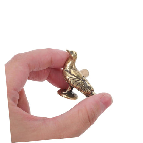 Brass Dove Cabinet Pulls Set Two Pack Smooth Safe Touch DIY Installation Vintage Peaceful Design in hand