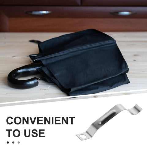 Rock Solid Metal Push Button Spring Clip For Zero Hassle Umbrella Repair And Patio Sun Shade Replacement on a wooden table.