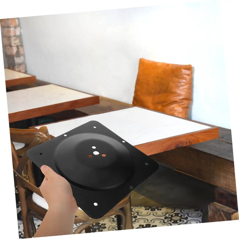 Rock Solid Table Leg Connector Kit With Multi Hole Metal Brackets For Desk Assembly And Furniture Fixups Featuring Damn Sturdy Iron Plates being held with a dark matte black finish.