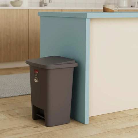 Gray step on trash can with lid 8.25 gallon by kitchen counter, compact design, quiet close, space-saving foot pedal bin