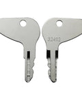 Close-up of 2 keys from 4 Pack Ignition Keys Replacement For Kubota L G And M Series Tractors Built For Heavy Duty Farm Use Fits Mahindra