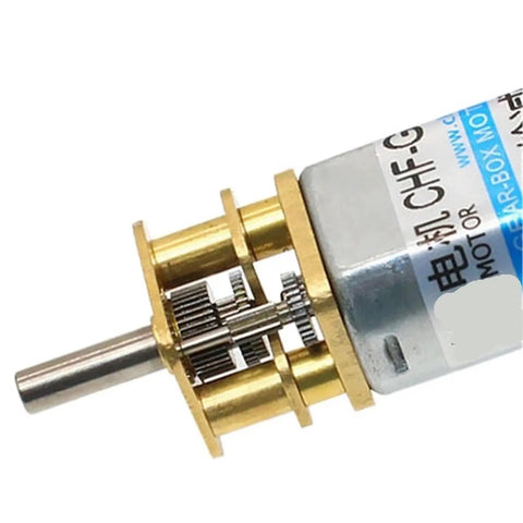 Versatile DC Gear Motor Engine With Durable Metal Construction For 3V 6V 12V Systems. Close-up showing gears in metal casing.