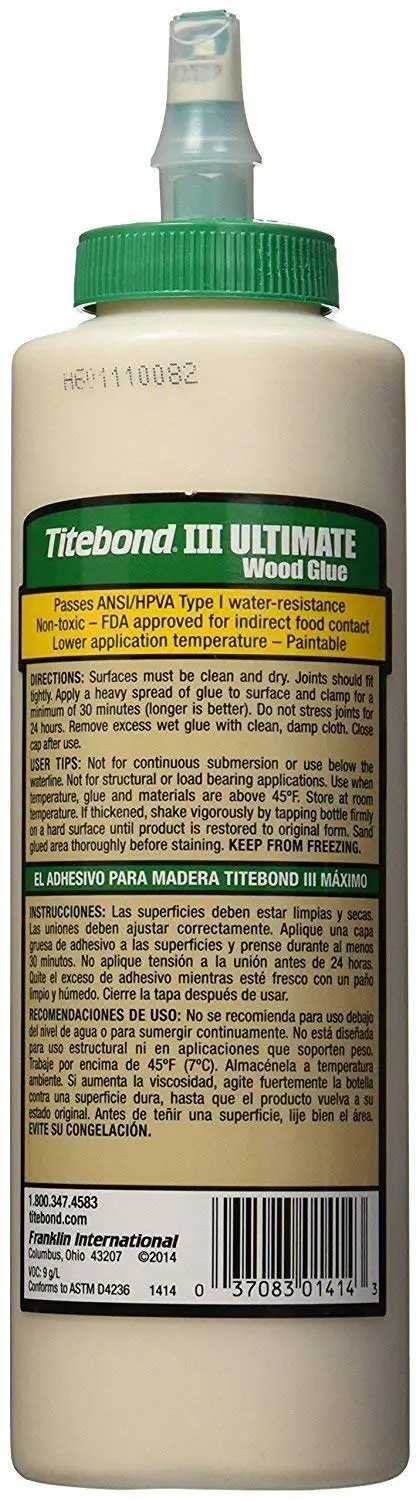 Premium Tan Wood Glue Offering Heavy Duty Grip For Diy Builders Waterproof And Fast Curing Formula Non Toxic Adhesive For Workshop Projects That Bonds Solid And Survives The Elements 16 Oz bottle with green cap and detailed label.