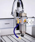 Close-up of the Heavy Duty 3 Axis Cnc Router 6040 Engraving Machine with a 2200 Watt spindle and cooling hose.