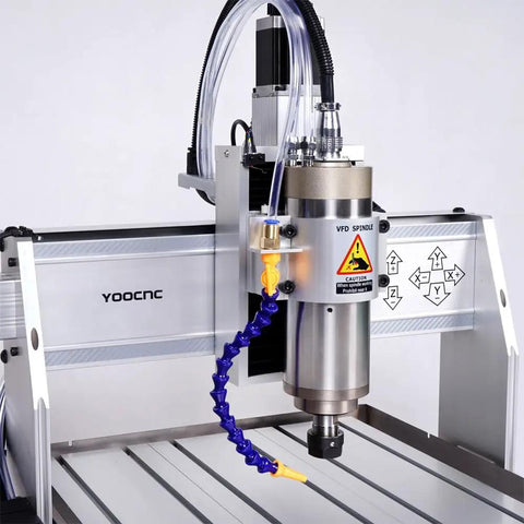 Close-up of the Heavy Duty 3 Axis Cnc Router 6040 Engraving Machine with a 2200 Watt spindle and cooling hose.