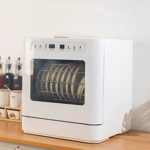 Skip the Sink Fully Automatic Desktop Dishwasher For Home Kitchen Large Capacity Auto Wash System With Triple Filter And Front Loading Design Easy Setup Plumbing Free Hands Off Cleanup Routine with dishes inside on a wooden countertop.