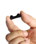 Fingers holding a component of Drop Away Arrow Rest Felt Kit With 2 Pairs Felt Tapes And 2 Arrow Holder Pads Adhesive For Compound Bows
