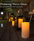 Lit 10 Inch Outdoor Flameless Candles With Remote And Timer, Waterproof LED Pillar Candles on porch in lanterns