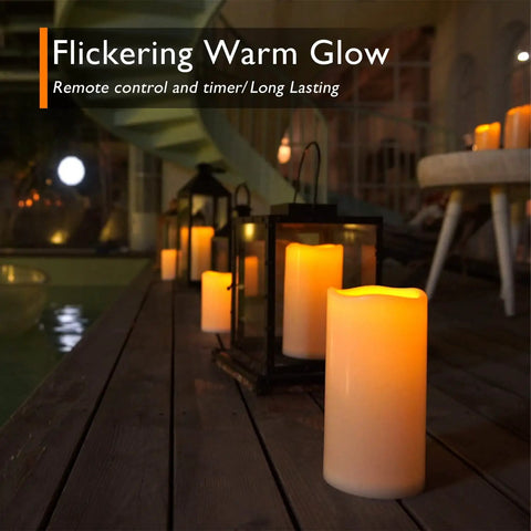 Lit 10 Inch Outdoor Flameless Candles With Remote And Timer, Waterproof LED Pillar Candles on porch in lanterns