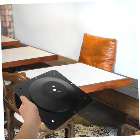 Heavy Duty Cast Iron Table Leg Connector Plate Rock Solid Five Hole Leg Mounting Bracket For Couch Furniture Diy Assembly shown held in hand.