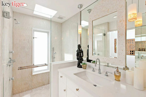Modern bathroom with glass shower enclosure and chrome fixtures, featuring 16 Inch Modern Stainless Steel Door Handle Pulls In Chrome Mirror Polish Finish For Wood Glass And Metal Doors Push Pull Bar For Single Or Double Doors Sliding Barn Doors And Shower Pulls With Square Rectangle Design.