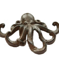 Heavy Duty Cast Iron Octopus Wall Hooks With Sleek Nautical Vibes And Aged Dark Brown Finish For Hanging Coats Keys Towels And Gear Built Like A Tank With Real Antique Charm That Truly Pops, close-up view.