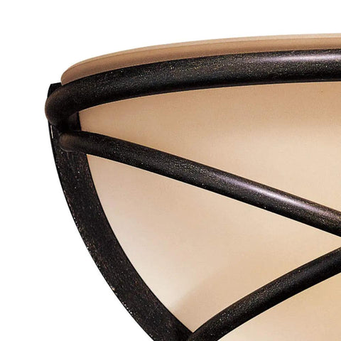 Close-up of Aspen II 1 Light Wall Sconce in Aspen Bronze finish, Rustic Scavo glass shade, highlighting design detail for hallways.