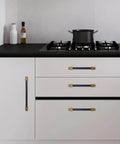 Kitchen with installed 10 Pack 5 Inch Black And Antique Brass Kitchen Cabinet Handles Knurled Cabinet Pulls on white cabinets.