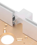 Close-up of Precision Router Lift System For Woodworking Benches with aluminum build and marked guide railing.
