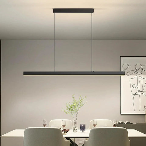 Zihoi Modern Ceiling Pendant Light,31.5in LED Black Linear Ceiling Chandelier Light Dining Room over a dining table.
