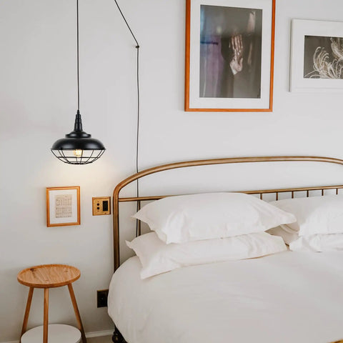 Sick Style Industrial Black Cage Plug In Pendant Light With Dimmable Switch Wall Outlet Fixture above bed for cozy ambient lighting.