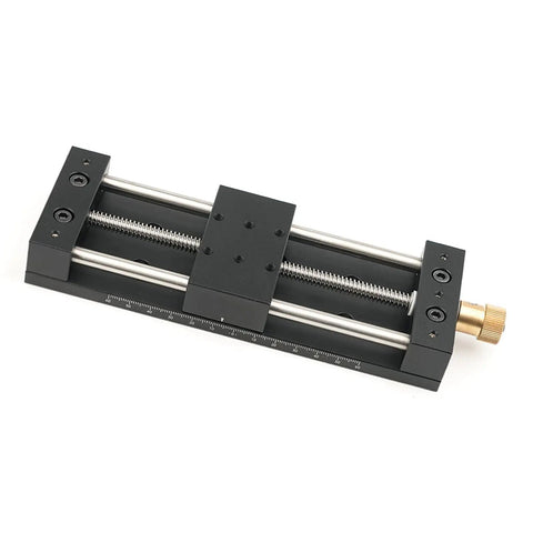 Built Tough Aluminum Manual Sliding Table Actuator Delivering Dead Nuts Precision Smooth Linear Motion With Rock Solid Stability For Heavy Duty Industrial Projects, black coated with manual dial and ruler.