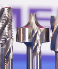Drill America HSS end mills set, five pieces, metallic silver finish.