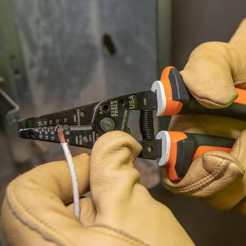 Electrician Insulated Wire Stripper And Cutter With 1000V Rating And VDE Certified Three Part White Warning Insulation In Use