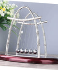 Large Newton Cradle Pendulum Desktop Physics Toy For Home Office Use Five Ball Demonstration on wooden desk