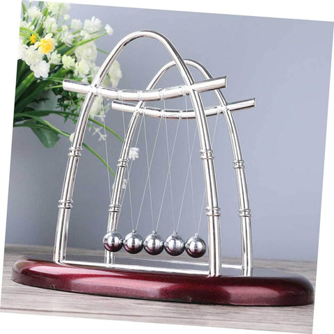 Large Newton Cradle Pendulum Desktop Physics Toy For Home Office Use Five Ball Demonstration on wooden desk