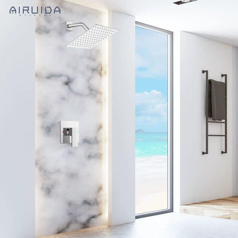 Rain Shower System With 8 Inch Square Showerhead, Easy Install 1-Handle Trim Kit, Chrome Finish, Stainless Steel Head And Brass Valve, Female Thread Rough-In, Cover Plate With H And C Labels installed in marble-walled bathroom