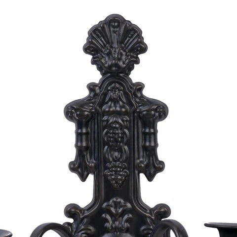 Close-up of a Premium Black And Gold Metal Candle Sconces Set Of Two, Gothic Wall Decor for Living Room, rustic iron detail.