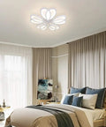 Lit 80W LED Ceiling Light with Remote in flower shape, mounted above a modern bedroom, showing dimmable and changeable color temperature.