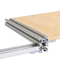 Close-up of Built Tough Heavy Duty Aluminum Shelf Brackets Set for 202, 3030 and 4040 Corner Fittings with wood shelf attached.