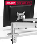 Slick Monitor Arm Desktop Mount Featuring Smooth Gas Spring Glide with silver finish attached to desk for easy screen adjustment.