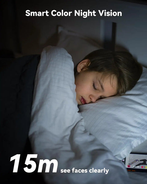 Child sleeping under blanket with Smart Color Night Vision text and 15m see faces clearly indicator, 2K WiFi Indoor Security Camera For Pets And Baby With AI Motion And Sound Detection, 360 Degree Pan And Tilt For Real, Smart Tracking, Infrared Night Vision, Built In Siren, Two Way Audio, Alexa Compatible Home Surveillance