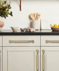 Modern kitchen with Ten Pack 5 Inch Satin Brass Cabinet Pulls Heavy Duty Brushed Brass Handles on white cupboards