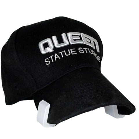 Hat Shaper Brim Bender Set for Perfect Curve on Fitted Hats in use on black cap with white text, adjustable size tool visible.