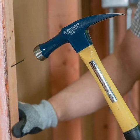 Electrician's Straight-Claw Hammer 18 Ounce Workhorse With Extra-Long Neck, in use on wooden frame