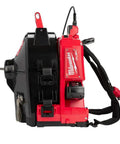 Milwaukee Fuel backpack power tool, black and red, side view, designed for efficient job site use, cordless, lightweight.